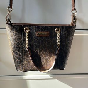 Dark brown with brown "ck" lettering